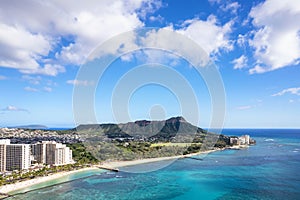 Aerial view of Waikiki beaches and its hotels and condominiums, Kapiolani Park and Diamond Head