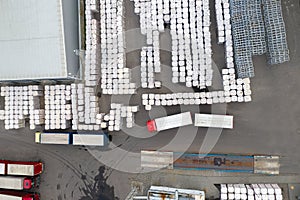 Aerial view of warehouse storages or industrial factory or logistics center from above photo