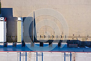 Aerial view of warehouse storages or industrial factory or logistics center from above. Aerial view of industrial buildings and