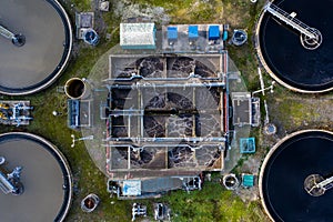 Aerial view of waste water treatment plant with tanks