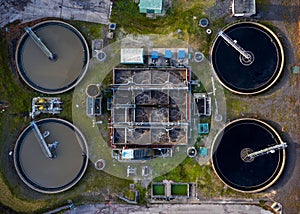 Aerial view of waste water treatment plant with tanks