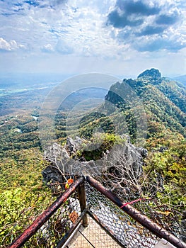 Aerial view of Wat Chaloem Phra Kiat Phrachomklao Rachanusorn, sky pagodas on top of mountain in Lampang Thailand