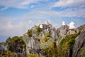 Aerial view of Wat Chaloem Phra Kiat Phrachomklao Rachanusorn, sky pagodas on top of mountain in Lampang Thailand