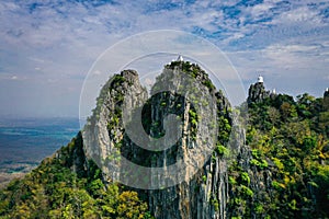 Aerial view of Wat Chaloem Phra Kiat Phrachomklao Rachanusorn, sky pagodas on top of mountain in Lampang Thailand