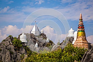 Aerial view of Wat Chaloem Phra Kiat Phrachomklao Rachanusorn, sky pagodas on top of mountain in Lampang Thailand