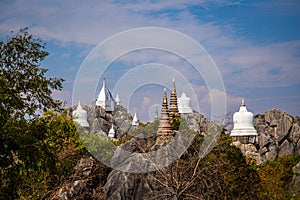 Aerial view of Wat Chaloem Phra Kiat Phrachomklao Rachanusorn, sky pagodas on top of mountain in Lampang Thailand