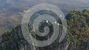 Aerial view of Wat Chaloem Phra Kiat Phrachomklao Rachanusorn, sky pagodas on top of mountain in Lampang Thailand