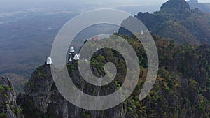 Aerial view of Wat Chaloem Phra Kiat Phrachomklao Rachanusorn, sky pagodas on top of mountain in Lampang Thailand