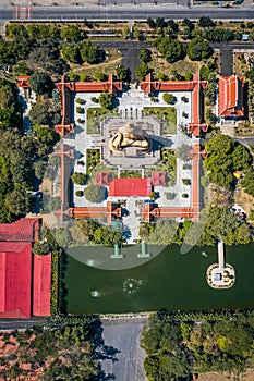 Aerial view of Wat Pikul Thong Phra Aram Luang or Wat Luang Por Pae temple with giant Buddha, in Sing Buri, Thailand