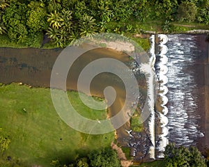 Aerial view of the Water flowing from the stream to the dam in Malaysia