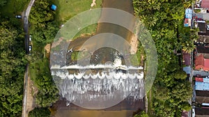 Aerial view of the Water flowing from the stream to the dam in Malaysia