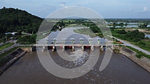 Aerial view of water released from the drainage channel of the concrete dam is a way of overflowing water in the rainy season.