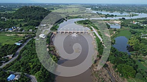 Aerial view of water released from the drainage channel of the concrete dam is a way of overflowing water in the rainy season.