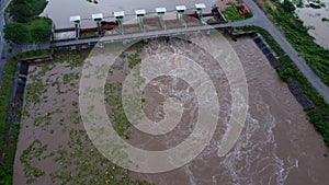 Aerial view of water released from the drainage channel of the concrete dam is a way of overflowing water in the rainy season.