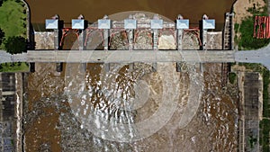 Aerial view of water released from the drainage channel of the concrete dam is a way of overflowing water in the rainy season. Top