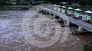 Aerial view of water released from the drainage channel of the concrete dam is a way of overflowing water in the rainy season. Top