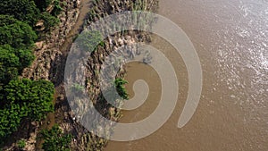 Aerial view of water released from the drainage channel of the concrete dam is a way of overflowing water in the rainy season. Top