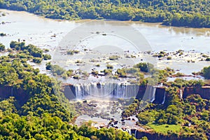 Aerial view of a waterfall. Environment with lots of green. Mata Atlantica do Brasil, Iguacu River in the interior of the state o photo