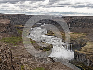 Aerial view of the waterfall Hafragilsfoss and the surrounding canyon Jokulsargljufur seen from the east bank of river Jokulsa a