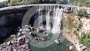 Aerial view of a waterfall and landscape in Chile