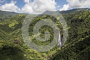 Aerial view of waterfall Manawaiopuna Falls, used in Jurassic park, Kauai, Hawaii