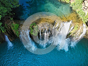 aerial view of a waterfall produced by the elsa river in tuscany