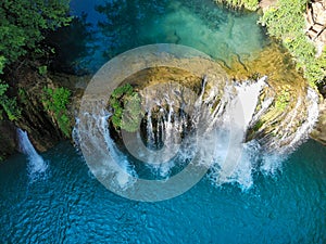 aerial view of a waterfall produced by the elsa river in tuscany photo