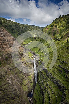 Aerial view of waterfall in Waimea Canyon, Kauai, Hawaii