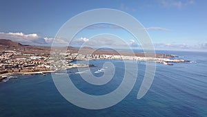 Aerial view of waves crashing on the bay of Corralejo, Fuerteventura