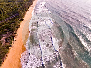 Aerial view of Waves crashing on sandy shore,Sea surface ocean waves background,Top view beach background