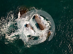 Aerial view of Waves crashing on seashore,Sea surface ocean waves background