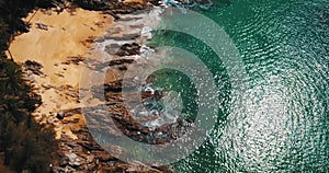 Aerial view of waves crushing on the rocks