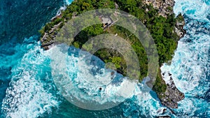 Aerial view of the waves hit the rocks at Crystal Bay beach Nusa Penida, Bali