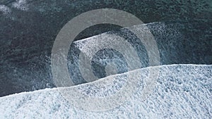 Aerial view of waves and lagoon at Rarotonga