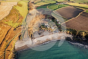 Aerial view of the Welsh seaside village of Abereiddy in a sunny, winters day