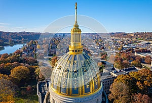 Aerial view of the West Virginia State Capitol Building and downtown Charleston with fall foliage