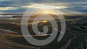 Aerial view of wetlands and delta of the Chamiza river at its mouth to the bosom of Reloncavi