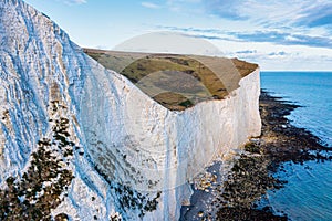 Aerial view of the White Cliffs of Dover. Close up view of the cliffs from the sea side.