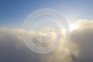 Aerial view White clouds in blue sky. Top fly. Looking from the drone. Aerial bird`s eye view. Aerial top view cloudscape. Textur