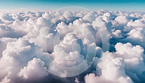 Aerial view on white fluffy clouds