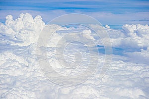 Aerial view on white fluffy clouds,blue sky and white cloud