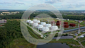 Aerial view white fuel storage tank in oil refinery plant. Stock. Top view white Industrial tanks for petrol and oil