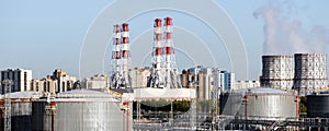 Aerial view white fuel storage tanks.