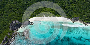 Aerial view of white sand beach tropical with seashore as the island in a coral reef ,blue and turquoise sea Amazing nature