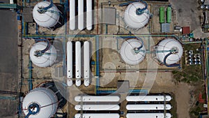 Aerial view white storage tank gas in station LPG gas, LNG or LPG distribution station facility, Oil and gas fuel manufacturing