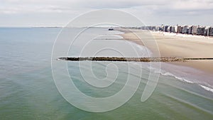 Aerial view of the white wooden pier in the town of Blankenberge