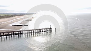 Aerial view of the white wooden pier in the town of Blankenberge on the Atlantic coast of Belgium