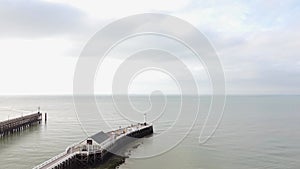 Aerial view of the white wooden pier in the town of Blankenberge on the Atlantic coast of Belgium