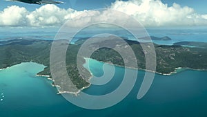 Aerial view of Whitsunday Islands archipelago from a flying airplane