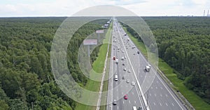 Aerial view on a wide highway with heavy traffic.